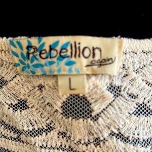 Gently used Off-white lace kimono ties in the front.